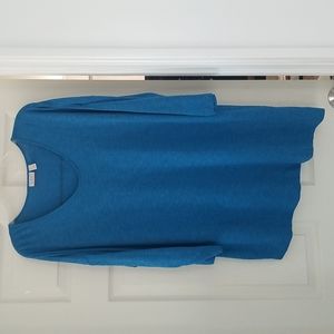 Used LOGO By Lori Goldstein blue long sleeve asymmetric top, size L.